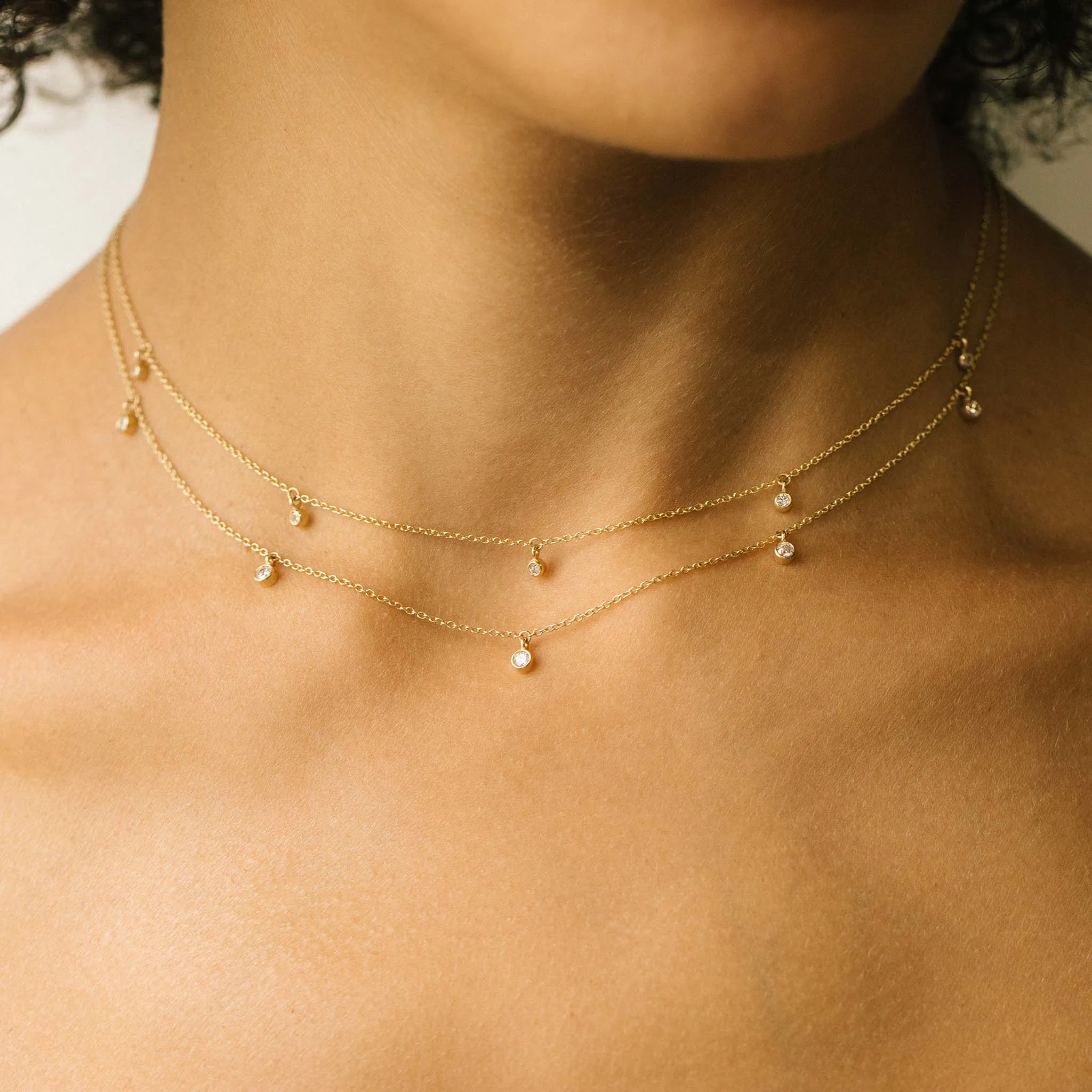 14k 5 Dangling Diamond Bezel Necklace