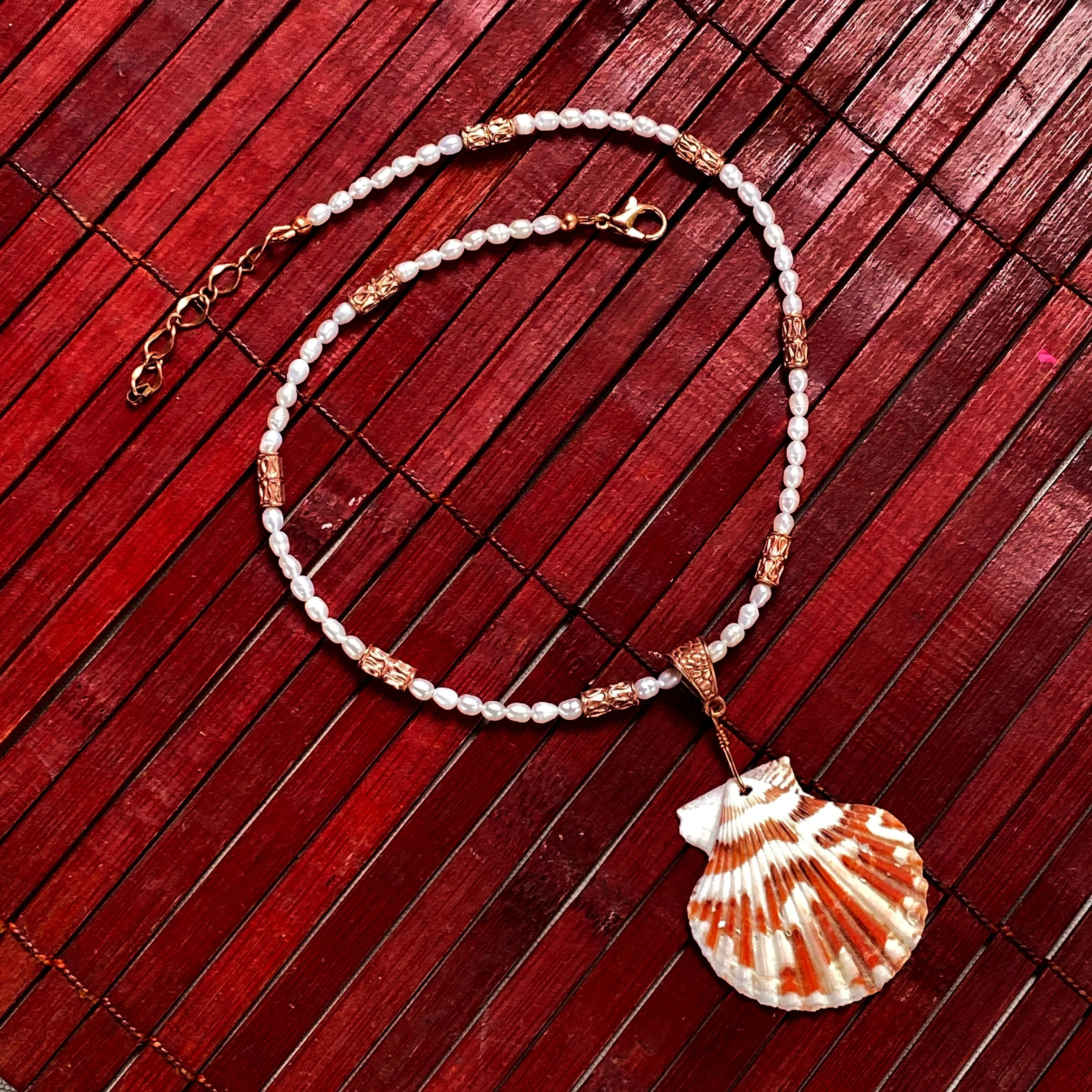 Elegant Beaded Pearl Necklace with Unique Shell Pendant