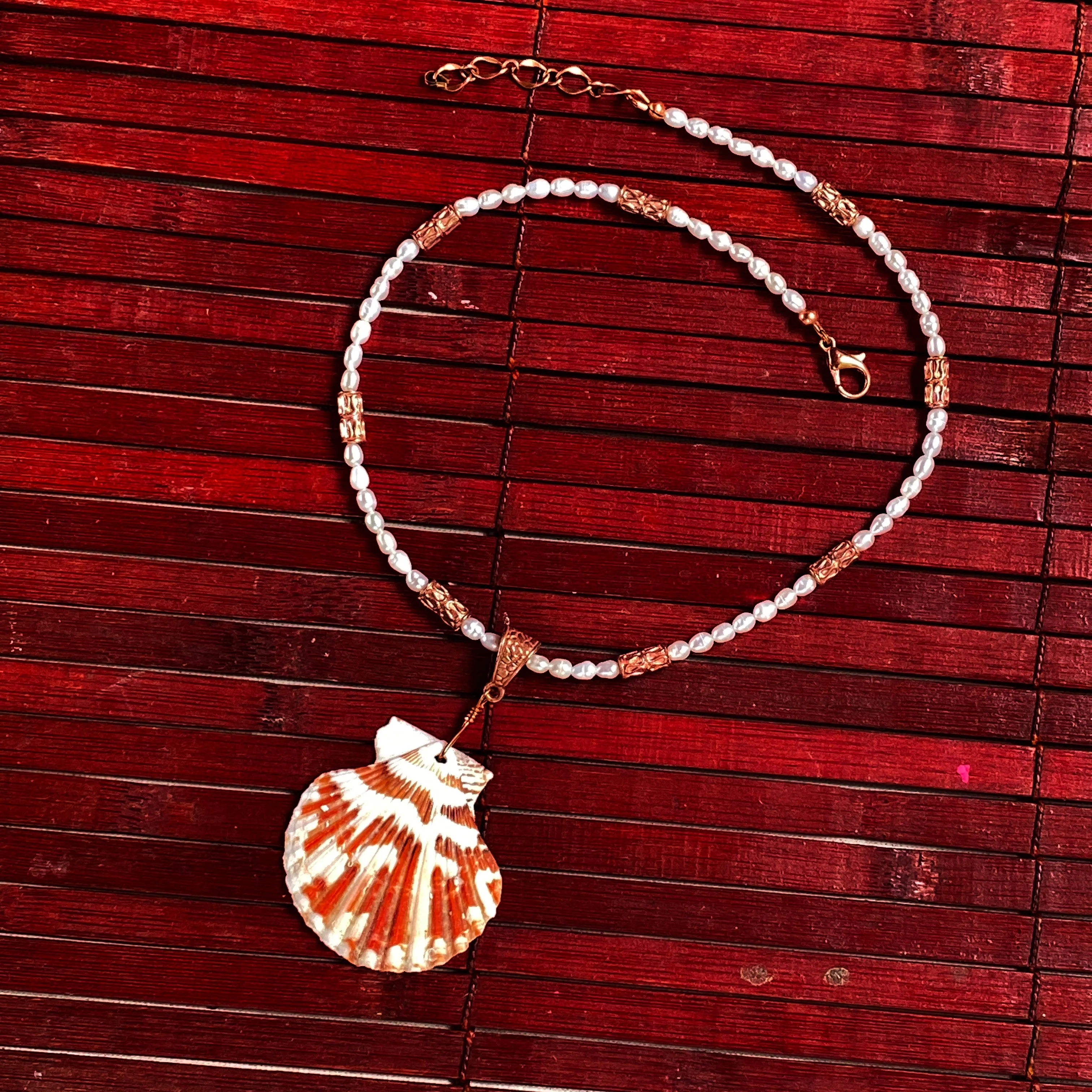 Elegant Beaded Pearl Necklace with Unique Shell Pendant